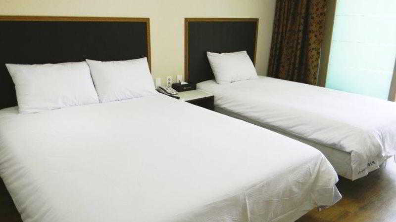 Sims Hotel Чеджудо Экстерьер фото